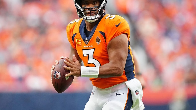 Sep 10, 2023; Denver, Colorado, USA; Denver Broncos quarterback Russell Wilson (3) prepares to pass to wide receiver Courtland Sutton (14) (not pictured) who scored a touchdown in the second quarter against the Las Vegas Raiders at Empower Field at Mile High. Mandatory Credit: Ron Chenoy-USA TODAY Sports