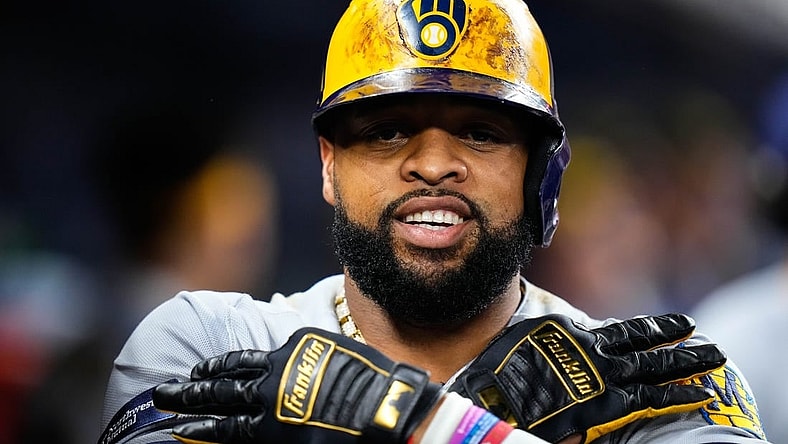 Sep 23, 2023; Miami, Florida, USA; Milwaukee Brewers first baseman Carlos Santana (41) celebrates hitting a three run home run against the Miami Marlins during the sixth inning at loanDepot Park. Mandatory Credit: Rich Storry-USA TODAY Sports