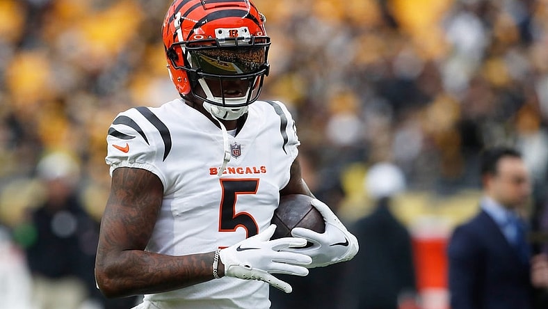 Dec 23, 2023; Pittsburgh, Pennsylvania, USA;  Cincinnati Bengals wide receiver Tee Higgins (5) warms up before the game against the Pittsburgh Steelers at Acrisure Stadium. Mandatory Credit: Charles LeClaire-USA TODAY Sports