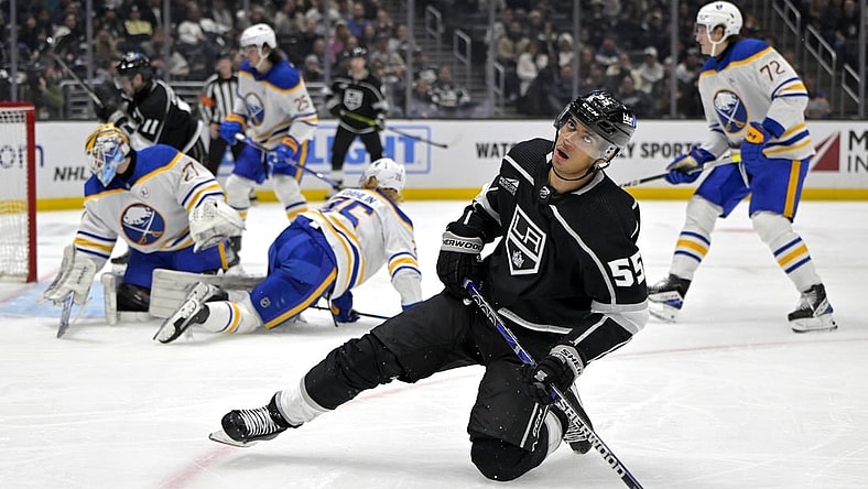 Jan 24, 2024; Los Angeles, California, USA; Los Angeles Kings right wing Quinton Byfield (55) reacts after a save off a shot on goal by Buffalo Sabres goaltender Devon Levi (27) in the second period at Crypto.com Arena. Mandatory Credit: Jayne Kamin-Oncea-USA TODAY Sports