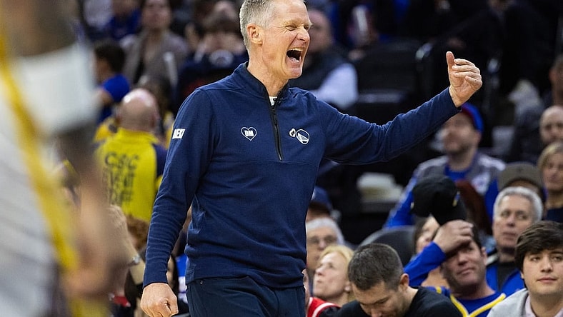Feb 7, 2024; Philadelphia, Pennsylvania, USA; Golden State Warriors head coach Steve Kerr reacts after a score against the Philadelphia 76ers during the third quarter at Wells Fargo Center. Mandatory Credit: Bill Streicher-USA TODAY Sports