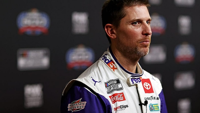 Feb 14, 2024; Daytona Beach, Florida, USA; NASCAR Cup Series driver Denny Hamlin (11) during Daytona 500 Media Day at Daytona International Speedway. Mandatory Credit: Peter Casey-USA TODAY Sports