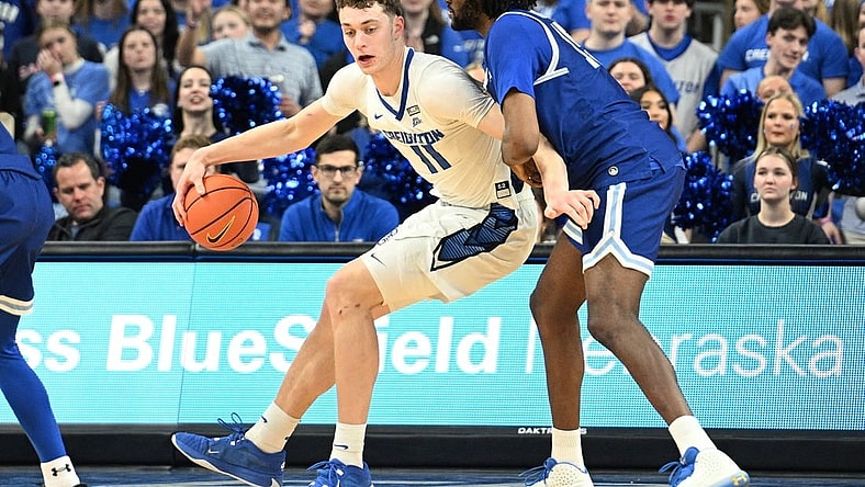 Feb 28, 2024; Omaha, Nebraska, USA; Creighton Bluejays center Ryan Kalkbrenner (11) drives against Seton Hall Pirates center Jaden Bediako (15) in the first half at CHI Health Center Omaha. Mandatory Credit: Steven Branscombe-USA TODAY Sports