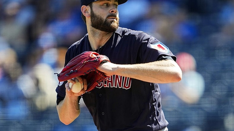 Sep 20, 2023; Kansas City, Missouri, USA; Cleveland Guardians starting pitcher Lucas Giolito (27) pitches during the first inning against the Kansas City Royals at Kauffman Stadium. Mandatory Credit: Jay Biggerstaff-USA TODAY Sports