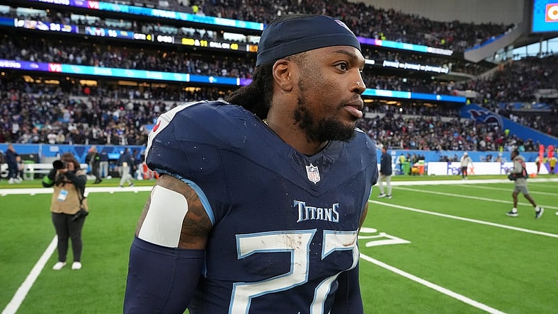Oct 15, 2023; London, United Kingdom; Tennessee Titans running back Derrick Henry (22) leaves the field after an NFL International Series game against the Baltimore Ravens at Tottenham Hotspur Stadium. Mandatory Credit: Kirby Lee-USA TODAY Sports