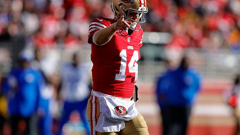 Jan 7, 2024; Santa Clara, California, USA; San Francisco 49ers quarterback Sam Darnold (14) celebrates after a play during the second quarter against the Los Angeles Rams at Levi's Stadium. Mandatory Credit: Sergio Estrada-USA TODAY Sports
