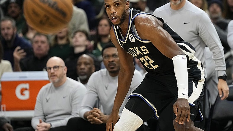 Jan 26, 2024; Milwaukee, Wisconsin, USA;  Milwaukee Bucks forward Khris Middleton (22) looks at the ball during the second quarter against the Cleveland Cavaliers at Fiserv Forum. Mandatory Credit: Jeff Hanisch-USA TODAY Sports