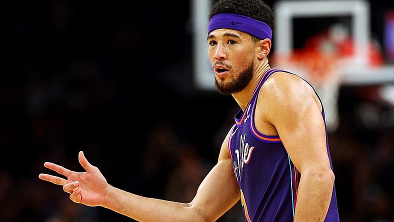 Feb 25, 2024; Phoenix, Arizona, USA; Phoenix Suns guard Devin Booker (1) reacts after a play during the first quarter of the game against the Los Angeles Lakers at Footprint Center. Mandatory Credit: Mark J. Rebilas-USA TODAY Sports