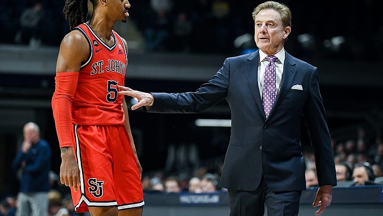 Feb 28, 2024; Indianapolis, Indiana, USA;  St. John's Red Storm guard Daniss Jenkins (5) talks with St. John's Red Storm head coach Rick Pitino during the second half at Hinkle Fieldhouse. Mandatory Credit: Robert Goddin-USA TODAY Sports