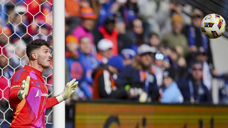 Mar 10, 2024; Cincinnati, Ohio, USA; D.C. United goalkeeper Alex Bono (24) makes a save in net against FC Cincinnati in the first half at TQL Stadium. Mandatory Credit: Aaron Doster-USA TODAY Sports
