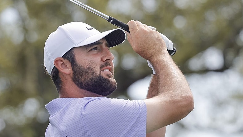 Mar 10, 2024; Orlando, Florida, USA;   Scottie Scheffler plays his shot from the seventh tee during the final round of the Arnold Palmer Invitational golf tournament. Mandatory Credit: Reinhold Matay-USA TODAY Sports