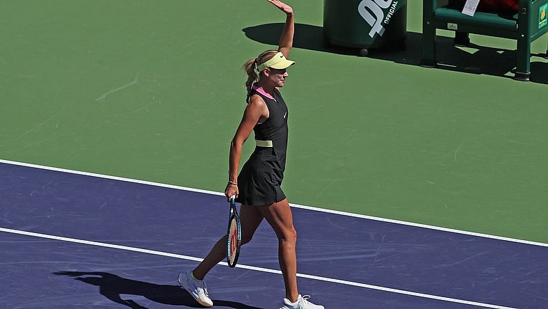Anastasia Potapova waves to the crowd after her fourth round win against Jasmine Paolini at the BNP Paribas Open in Indian Wells, Calif., on Tues., March 12, 2024.
