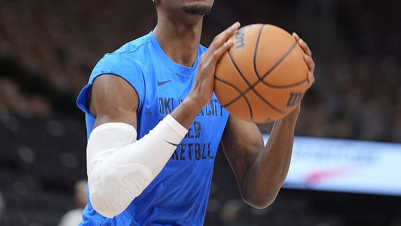 Mar 22, 2024; Toronto, Ontario, CAN; Oklahoma City Thunder guard Shai Gilgeous-Alexander (2) goes to shoot a basket during warm up before a game against the Toronto Raptors at Scotiabank Arena. Mandatory Credit: John E. Sokolowski-USA TODAY Sports
