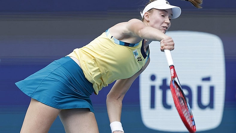 Mar 28, 2024; Miami Gardens, FL, USA; Elena Rybakina
(KAZ) serves against Victoria Azarenka (not pictured) on day eleven of the Miami Open at Hard Rock Stadium. Mandatory Credit: Geoff Burke-USA TODAY Sports