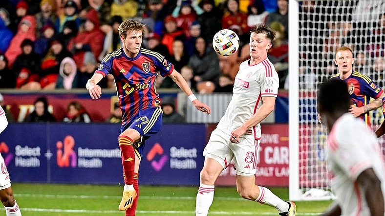 Mar 30, 2024; Sandy, Utah, USA; Real Salt Lake midfielder Bode Hidalgo (19) and St. Louis CITY SC midfielder Chris Durkin (8) battles for possession during the first half at America First Field. Mandatory Credit: Christopher Creveling-USA TODAY Sports