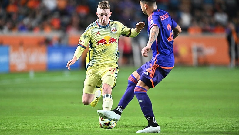 Mar 2, 2024; Houston, Texas, USA; New York Red Bulls midfielder Cameron Harper (17) dribbles the ball in the second half against Houston Dynamo FC at Shell Energy Stadium. Mandatory Credit: Maria Lysaker-USA TODAY Sports