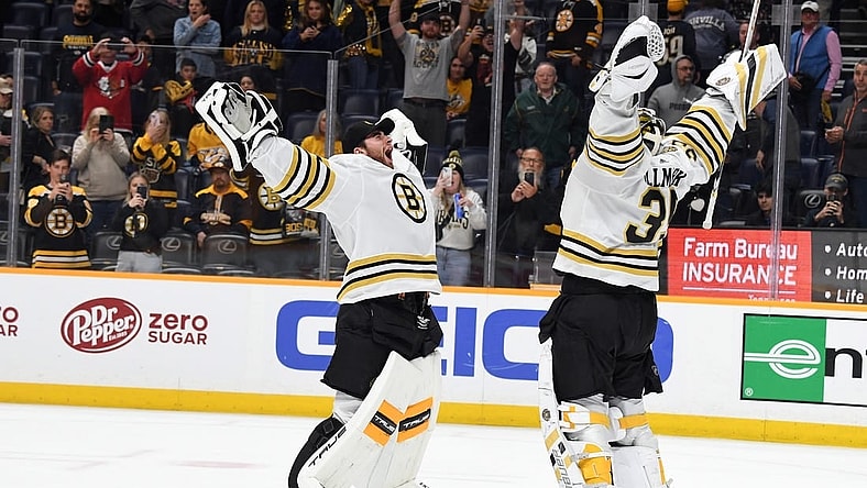 Apr 2, 2024; Nashville, Tennessee, USA; Boston Bruins goaltender Linus Ullmark (35) celebrates with goaltender Jeremy Swayman (1) after a win against the Nashville Predators at Bridgestone Arena. Mandatory Credit: Christopher Hanewinckel-USA TODAY Sports