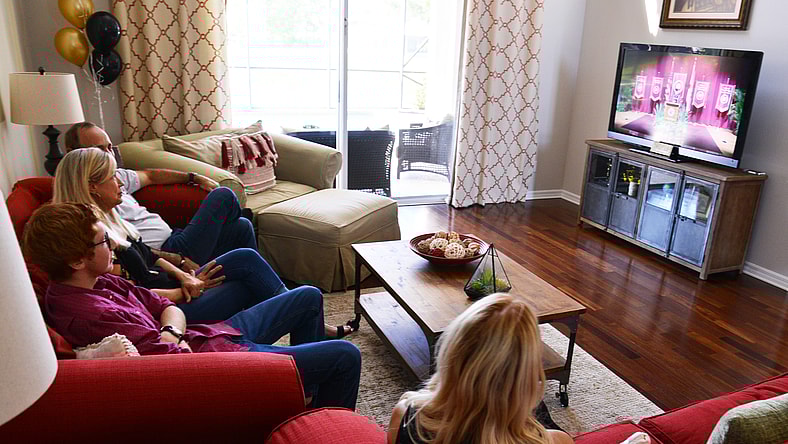 Syndication: Brevard || family watching streaming on tv