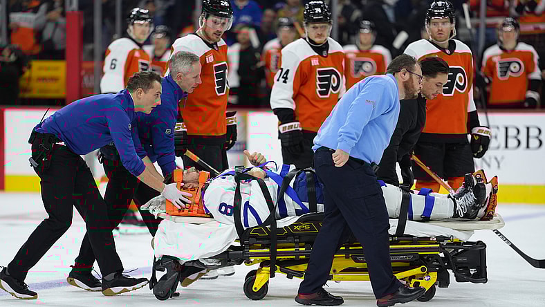 NHL: Chris Tanev taken off ice on stretcher, Toronto Maple Leafs at Philadelphia Flyers