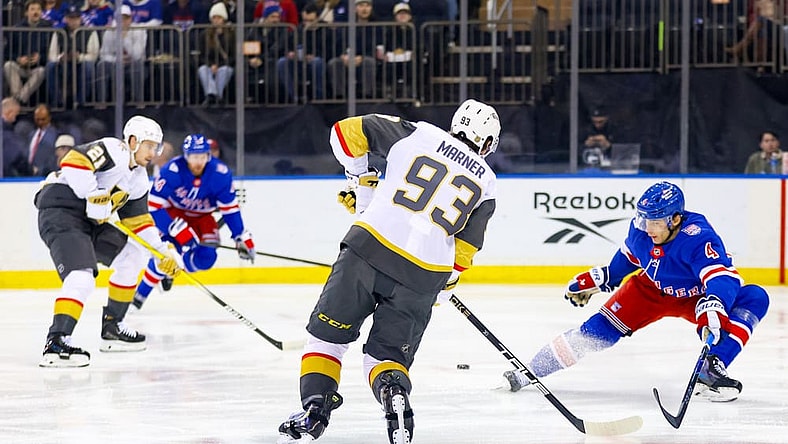 NEW YORK, NY - DECEMBER 07: Mitch Marner #93 of the Vegas Golden Knights sets up Brett Howden #21 of the Vegas Golden Knights for a goal during the first period of the National Hockey League game between the Vegas Golden Knights and the New York Rangers on December 7, 2025 at Madison Square Garden in New York, NY. (Photo by Joshua Sarner/Icon Sportswire)