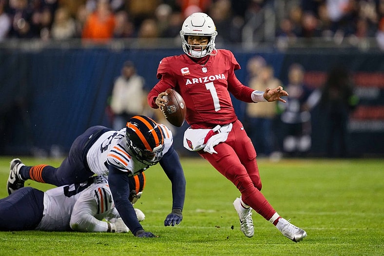 Dec 24, 2023; Chicago, Illinois, USA;  Arizona Cardinals quarterback Kyler Murray (1) runs with the ball against the Chicago Bears at Soldier Field. Mandatory Credit: Jamie Sabau-USA TODAY Sports