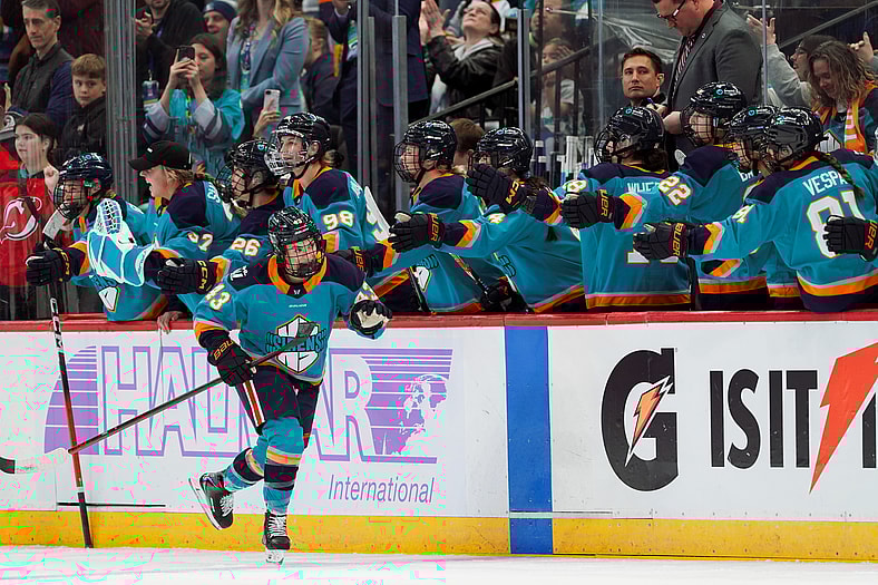 New York Sirens forward Kristin O'Neill celebrates a goal against the Vancouver Goldeneyes.