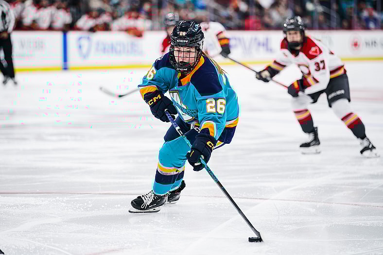 New York Sirens forward Casey O'Brien carries the puck against the Ottawa Charge.