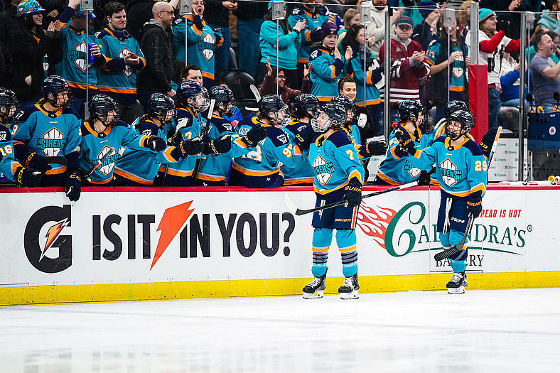 New York Sirens forward Savannah Norcross celebrates her first career PWHL goal.