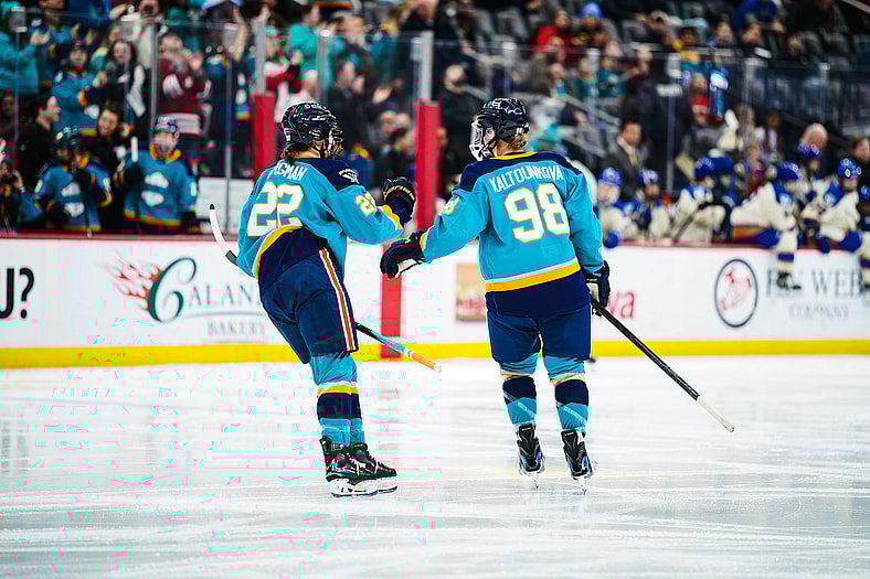 New York Sirens forward Kristyna Kaltounkova fist bumps Anna Bargman.