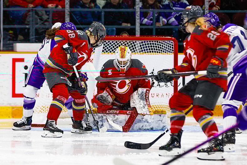 Ottawa Charge goalie Gwyneth Philips makes a save against the Minnesota Frost.
