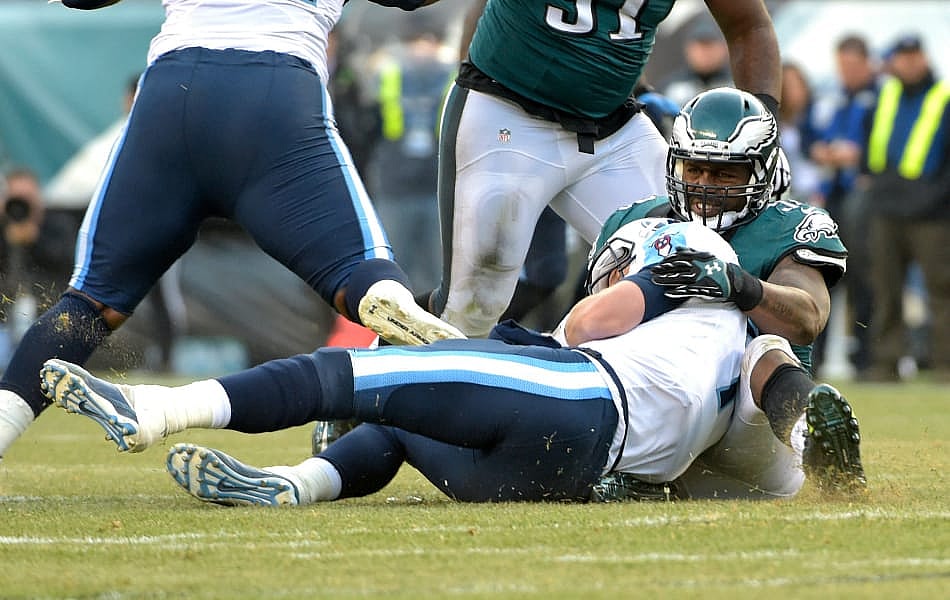 Photo: USA Today; It only appears as though Trent Cole is being gentle. He's not.
