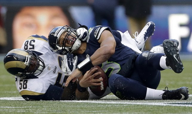 Courtesy of Mynorthwest.com: Wilson is elusive, but he needs his offensive line to step up. 