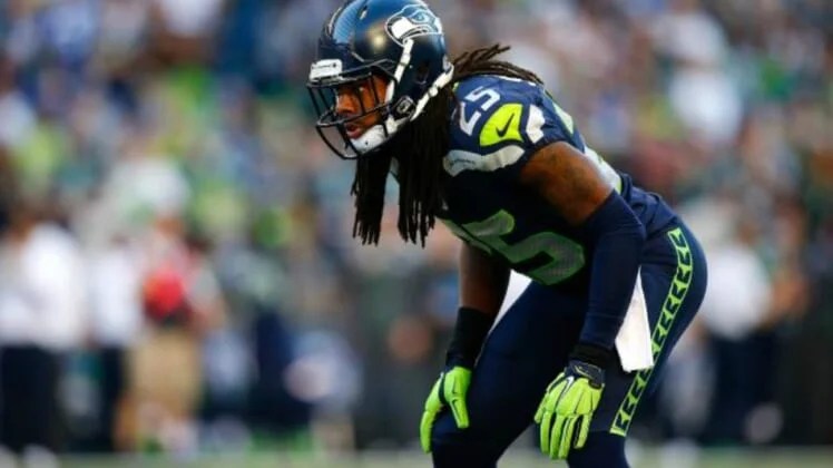 Seahawks cornerback Richard Sherman confronts Aaron Rodgers after game