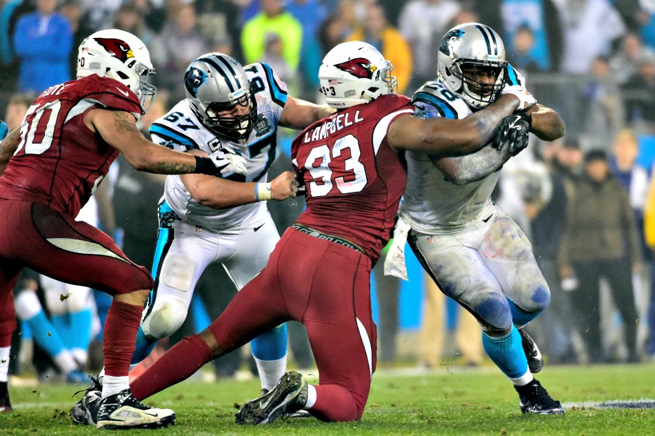 USA Today Images — Cardinals defensive end Calais Campbell tackles Panthers running back Jonathan Stewart for a loss in an NFC Divisional round game