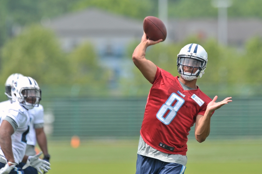 May 15, 2015; Nashville, TN, USA; Tennessee Titans first round draft pick quarterback Marcus Mariota (8) passes during his first minicamp work out at Saint Thomas Sports Park. Mandatory Credit: Jim Brown-USA TODAY Sports