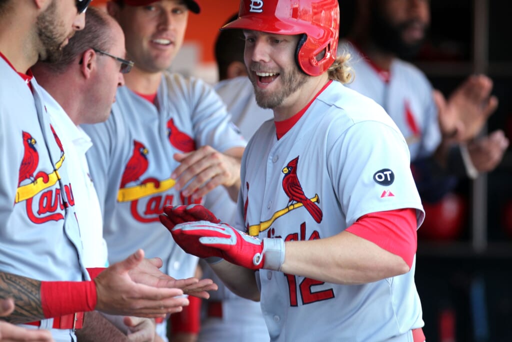 Aug 30, 2015; San Francisco, CA, USA; St. Louis Cardinals first baseman Mark Reynolds (12) is greeted in the dugout by his teammates after hitting a solo home run off San Francisco Giants relief pitcher Javier Lopez (not pictured) in the sixth inning of their MLB baseball game at AT&T Park. Mandatory Credit: Lance Iversen-USA TODAY Sports