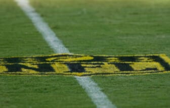 Aug 14, 2015; Jacksonville, FL, USA; A gold-painted NFL logo on the field before the start of a preseason NFL football game between the Pittsburgh Steelers and the Jacksonville Jaguars at EverBank Field. The logo is part of the NFL's "On the Fifty" campaign, to promote Super Bowl 50 next February. The Jacksonville Jaguars won 23-21. Mandatory Credit: Phil Sears-USA TODAY Sports