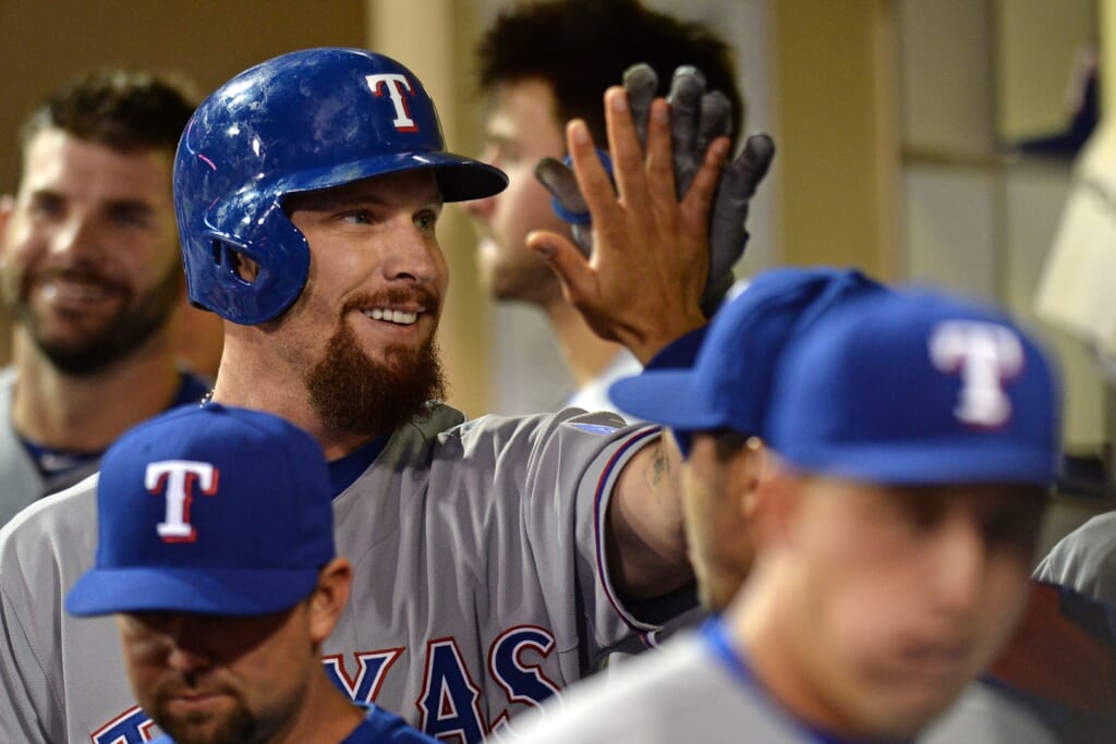 Sep 2, 2015; San Diego, CA, USA; Texas Rangers left fielder Josh Hamilton (32) is congratulated after being pinch run for after singling during the ninth inning against the San Diego Padres at Petco Park. Mandatory Credit: Jake Roth-USA TODAY Sports