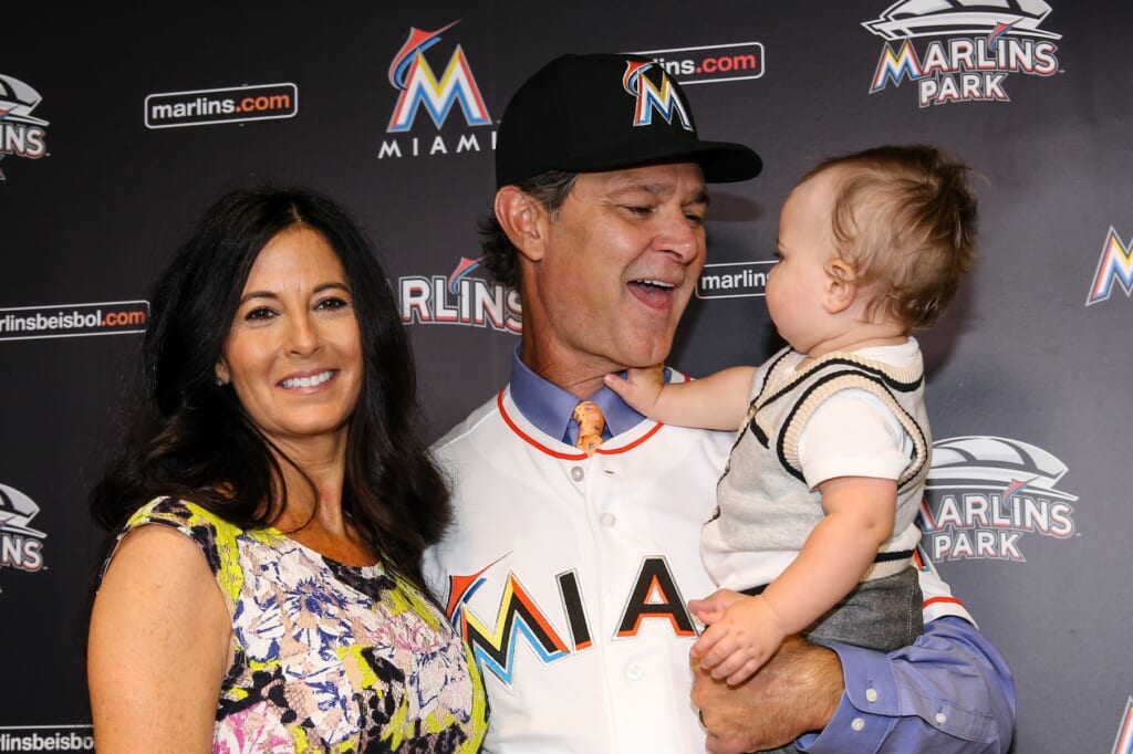 Nov 2, 2015; Miami, FL, USA; Miami Marlins manager Don Mattingly (center) holds his son Louie (right) next to his wife Lori (left) after a press conference at Marlins Park. Mandatory Credit: Steve Mitchell-USA TODAY Sports