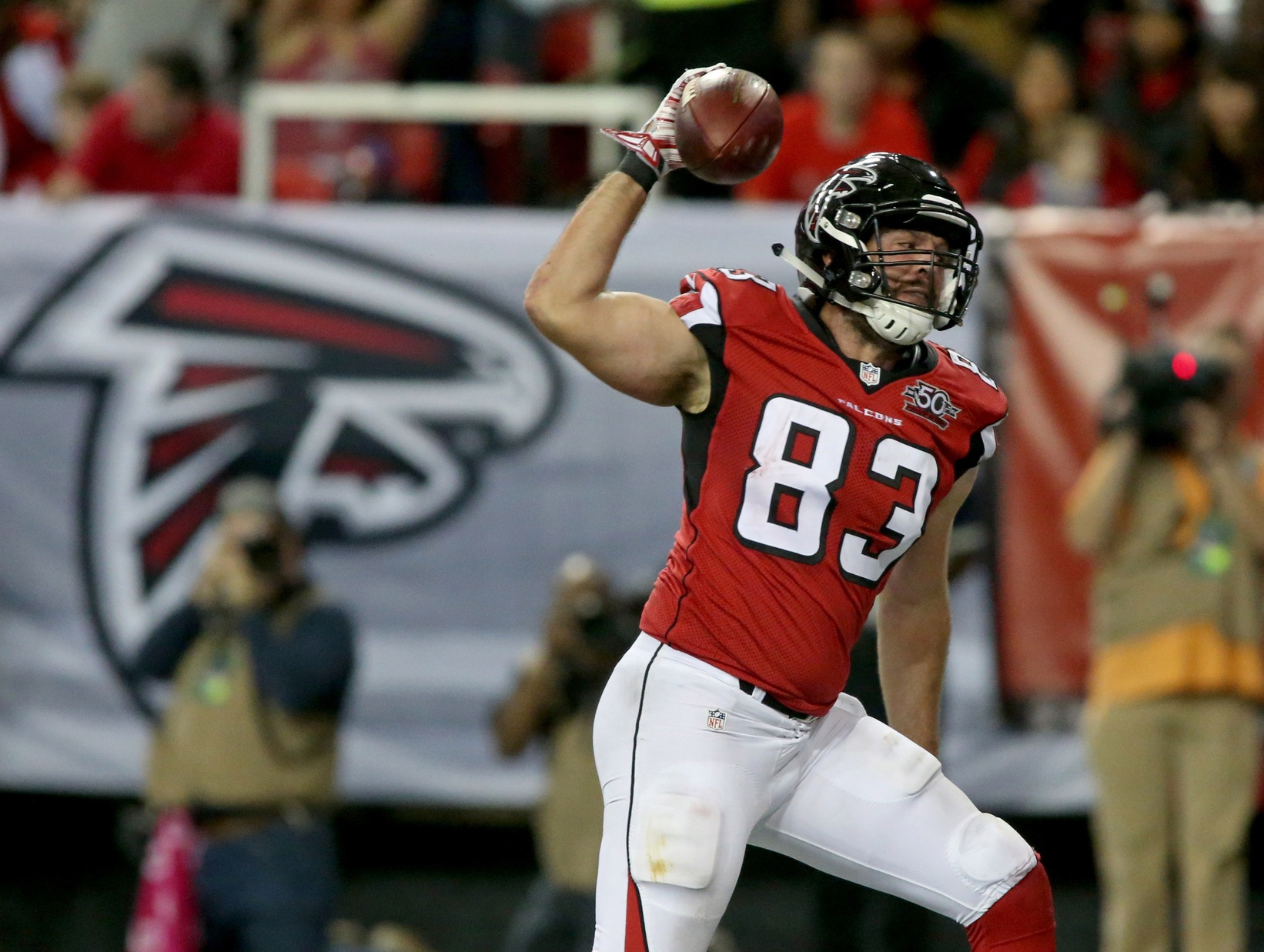 Nov 1, 2015; Atlanta, GA, USA; Atlanta Falcons tight end Jacob Tamme (83) celebrates his touchdown catch in the third quarter of their game against the Tampa Bay Buccaneers at the Georgia Dome. The Buccaneers won 23-20 in overtime. Mandatory Credit: Jason Getz-USA TODAY Sports