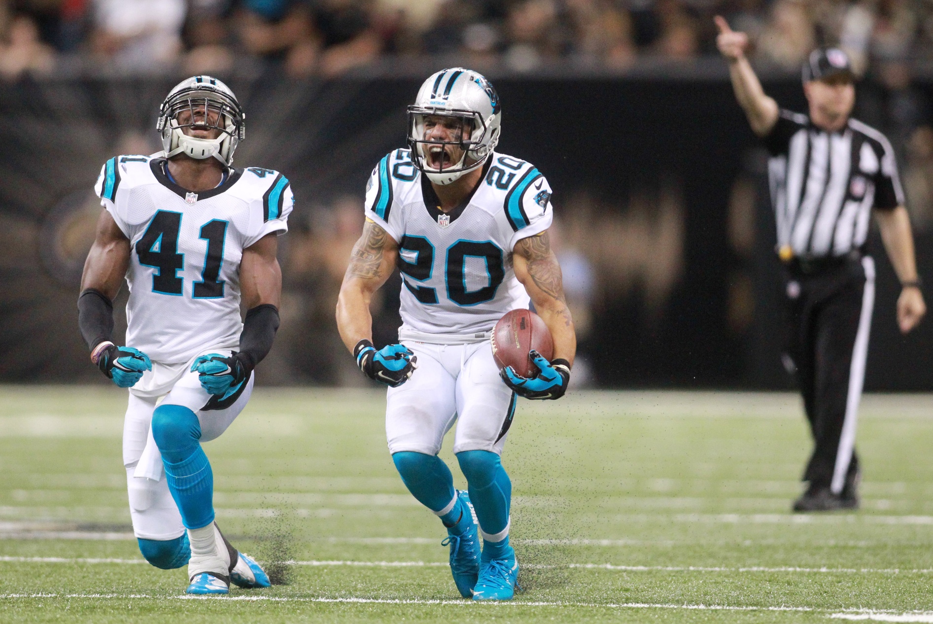 Dec 6, 2015; New Orleans, LA, USA; Carolina Panthers free safety Kurt Coleman (20) and strong safety Roman Harper (41) celebrate a turnover in the second half against the New Orleans Saints at Mercedes-Benz Superdome. The Panthers won 41-38. Mandatory Credit: Crystal LoGiudice-USA TODAY Sports