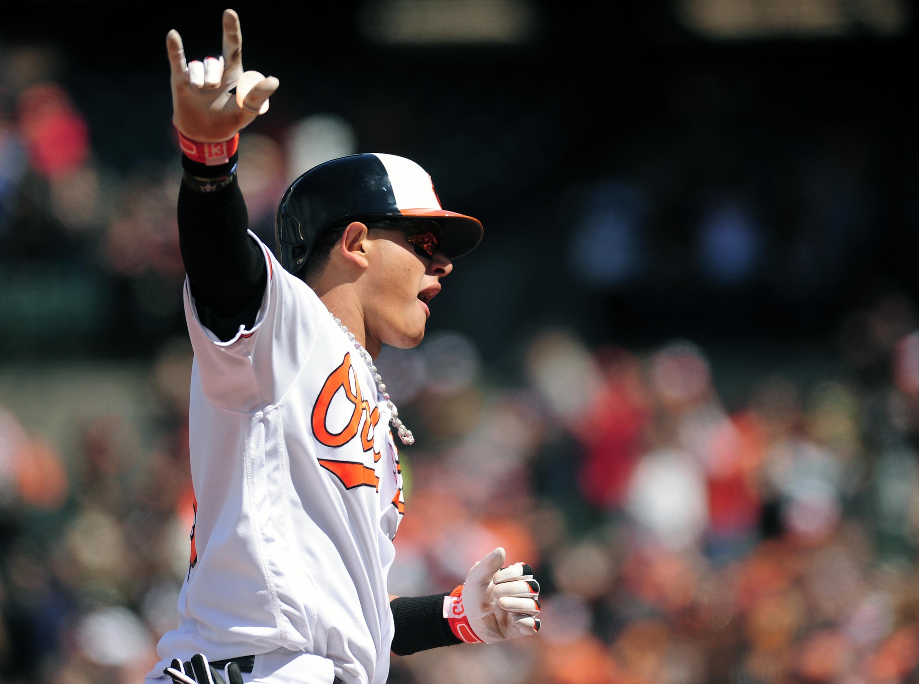 Apr 10, 2016; Baltimore, MD, USA; Baltimore Orioles third baseman Manny Machado (13) celebrates after hitting a home run in the second inning against the Tampa Bay Rays at Oriole Park at Camden Yards. Mandatory Credit: Evan Habeeb-USA TODAY Sports 