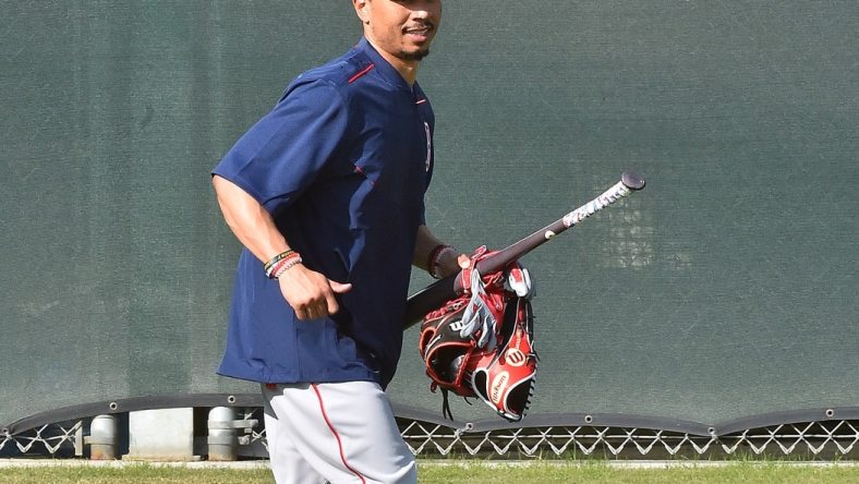 Feb 13, 2017; Lee County, FL, USA; Boston Red Sox right fielder Mookie Betts (50) runs on the field during reporting day for pitchers and catchers at JetBlue Park. Mandatory Credit: Jasen Vinlove-USA TODAY Sports