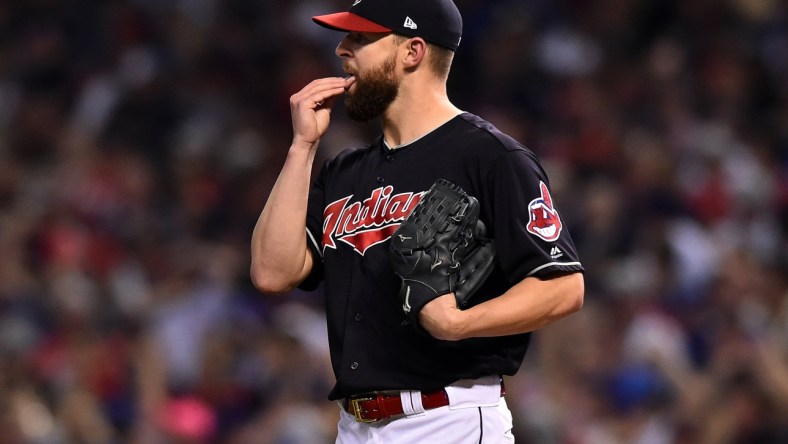 Nov 2, 2016; Cleveland, OH, USA; Cleveland Indians starting pitcher Corey Kluber (28) reacts after giving up a solo home run to Chicago Cubs center fielder Dexter Fowler (not pictured) in the first inning in game seven of the 2016 World Series at Progressive Field. Mandatory Credit: Ken Blaze-USA TODAY Sports