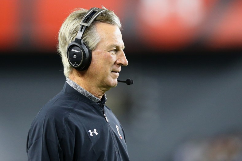 Caption: Nov 18, 2016; Cincinnati, OH, USA; Cincinnati Bearcats head coach Tommy Tuberville looks on from the sidelines against the Memphis Tigers in the first half at Nippert Stadium. Memphis won 34-7. Mandatory Credit: Aaron Doster-USA TODAY Sports