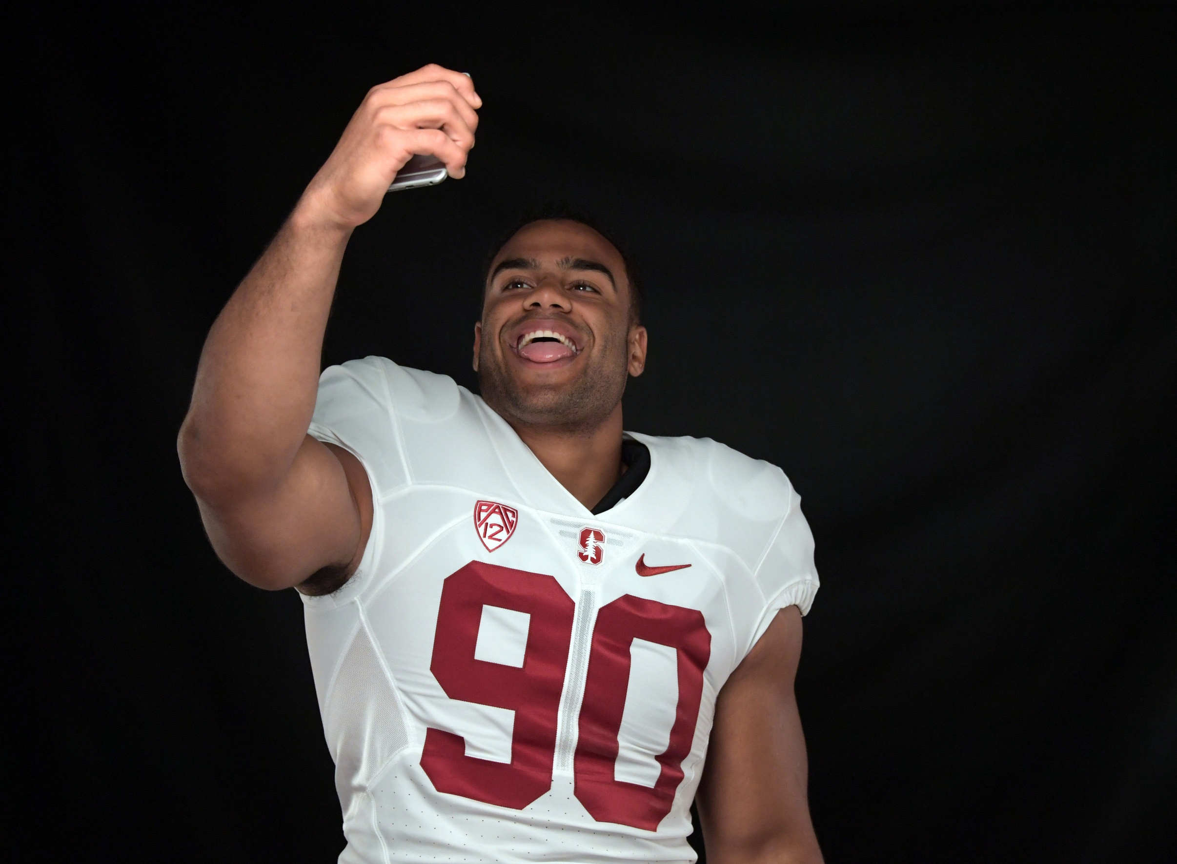 Jul 15, 2016; Hollywood, CA, USA; Stanford Cardinal defensive end Solomon Thomas takes a selfie during Pac-12 media day at Hollywood & Highland. Mandatory Credit: Kirby Lee-USA TODAY Sports