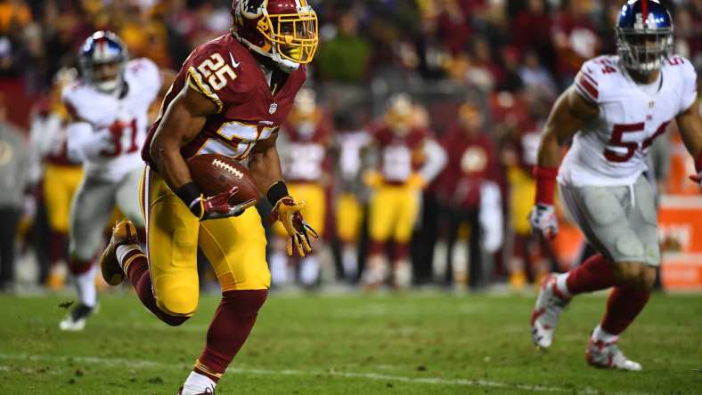 Jan 1, 2017; Landover, MD, USA; Washington Redskins running back Chris Thompson (25) rushes the ball against the New York Giants during the second half at FedEx Field. Mandatory Credit: Brad Mills-USA TODAY Sports