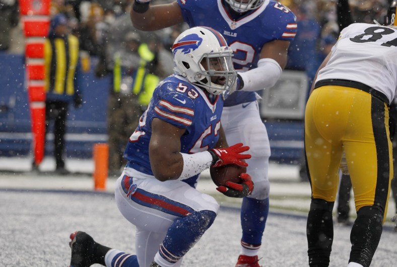 Dec 11, 2016; Orchard Park, NY, USA; Buffalo Bills inside linebacker Zach Brown (53) celebrates his interception during the second half against the Pittsburgh Steelers at New Era Field. Pittsburgh beat Buffalo 27-20. Mandatory Credit: Timothy T. Ludwig-USA TODAY Sports