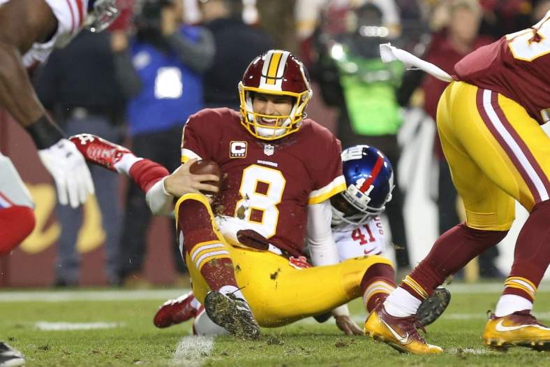 Caption: Jan 1, 2017; Landover, MD, USA; Washington Redskins quarterback Kirk Cousins (8) is sacked by New York Giants cornerback Dominique Rodgers-Cromartie (41) in the second quarter at FedEx Field. Mandatory Credit: Geoff Burke-USA TODAY Sports