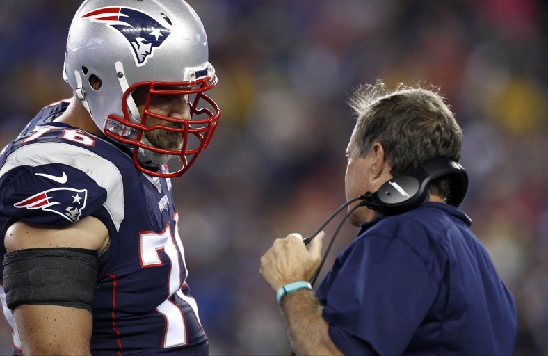 Sep 10, 2015; Foxborough, MA, USA; New England Patriots head coach Bill Belichick (right) speaks to tackle Sebastian Vollmer (76) during the first half of a game against the Pittsburgh Steelers at Gillette Stadium. Mandatory Credit: Mark L. Baer-USA TODAY Sports